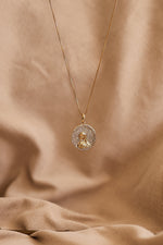 Load image into Gallery viewer, Collar virgen de Guadalupe en chapa de oro con zirconia.