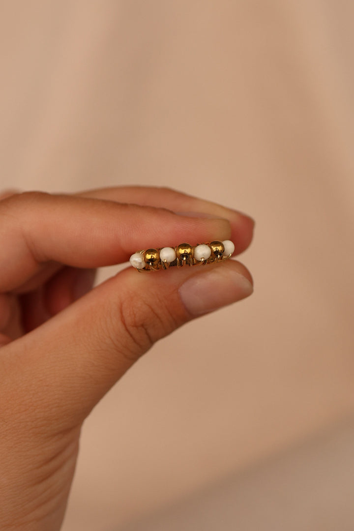 Anillo acero inoxidable con perlas de río talla #7