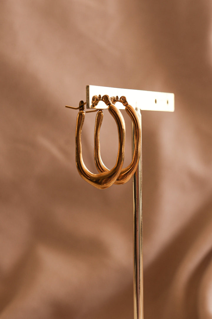 Arracada irregular acero inoxidable.