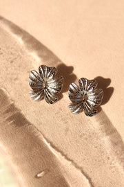 Arete acero inoxidable flor texturizada