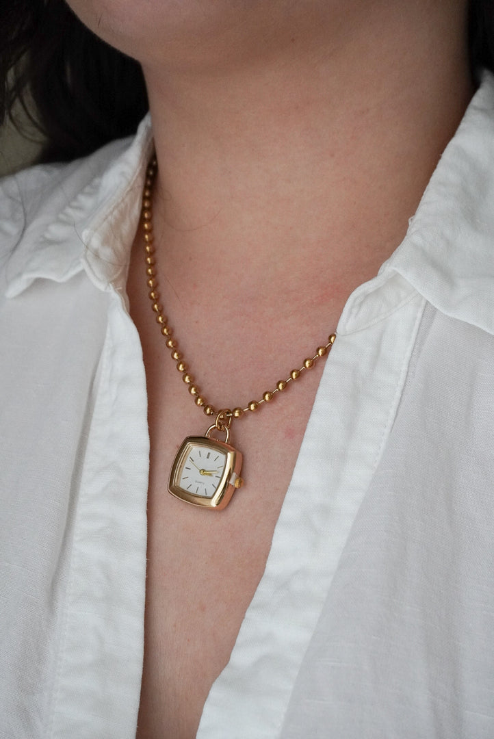 Collar reloj acero inoxidable.