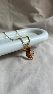 Collares de acero inoxidable con vidrio soplado.