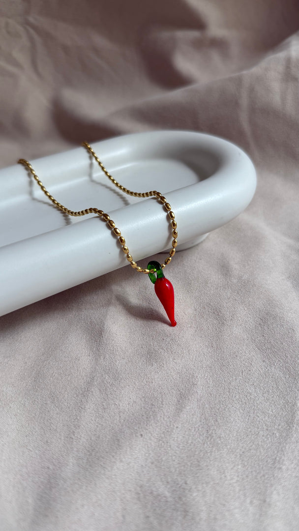 Collares de acero inoxidable con vidrio soplado.