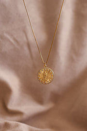 Collar virgen de Guadalupe en chapa de oro con zirconia.