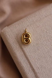 Collar inicial globo chapa de oro